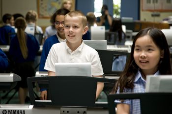 Children learning keyboard