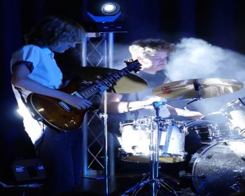 Bandits playing guitar and drums